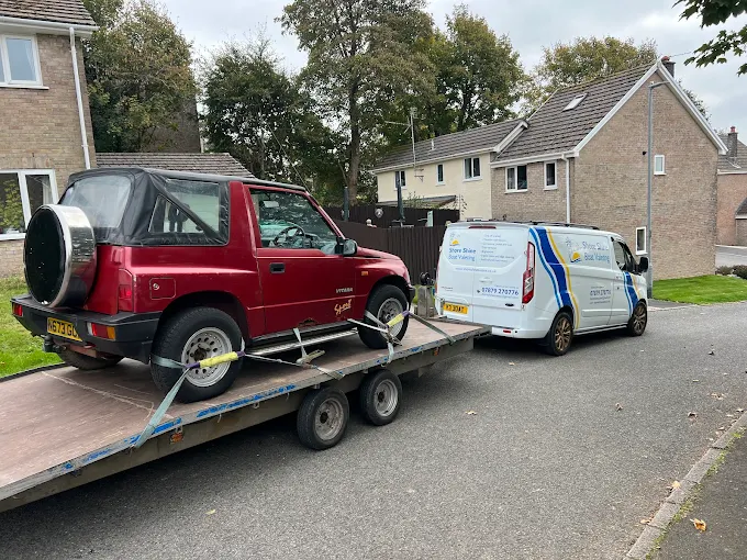 4x4 transported on a beavertail trailer